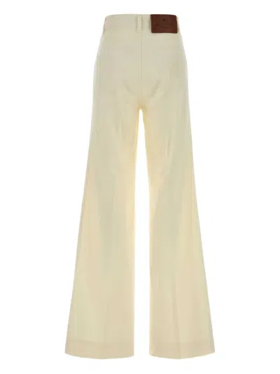 Etro Pegaso-buttons Flared Jeans In Neutral