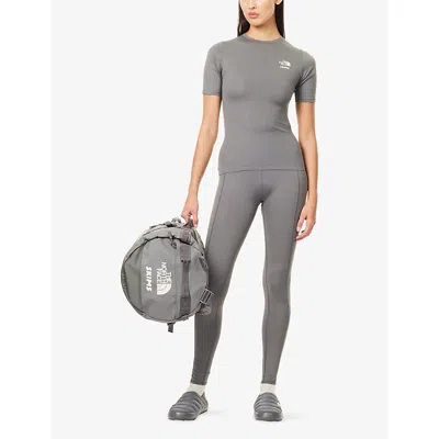 The North Face Womens  X Skims Refina Stretch-woven Short-sleeve Top In Gray