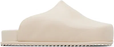 Yume Yume Beige Truck Slides In Sand