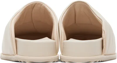 Yume Yume Beige Truck Slides In Sand