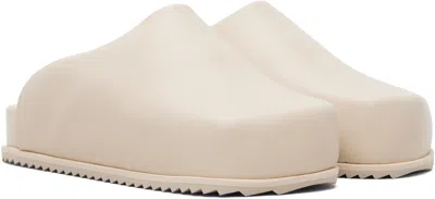 Yume Yume Beige Truck Slides In Sand