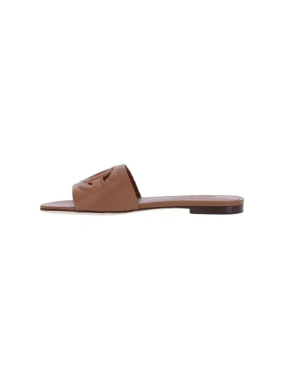 Dolce & Gabbana Slide Sandals With Cut Out Logo In Leather Woman In Brown