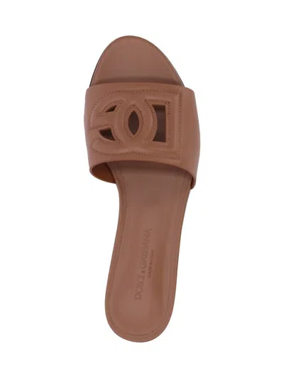 Dolce & Gabbana Slide Sandals With Cut Out Logo In Leather Woman In Brown
