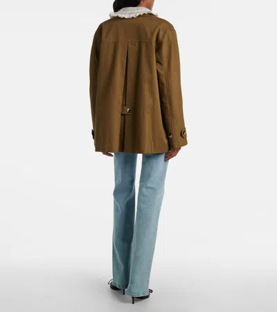 Frame Arrow High-rise Bootcut Jeans In Blue