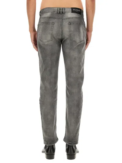 Balmain Regular Fit Washed Denim Jeans In Grey