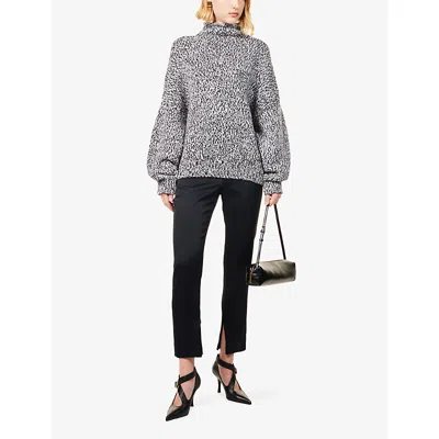 Khaite Womens Black Lenn Tapered-leg Woven Trousers In Black