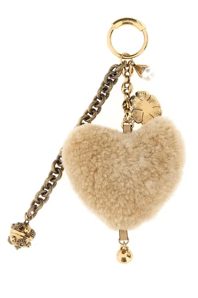 Chloé Two-tone Shearling And Metal Charm