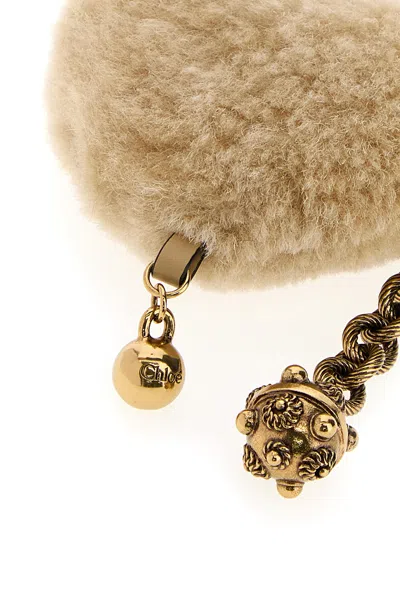 Chloé Two-tone Shearling And Metal Charm