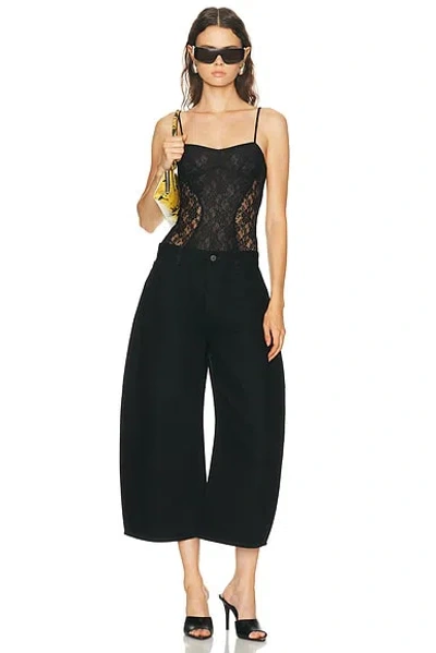 Attico Curved Short Leg In Black