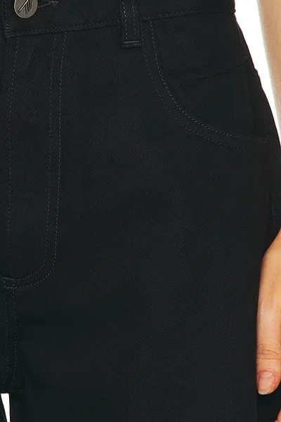 Attico Curved Short Leg In Black