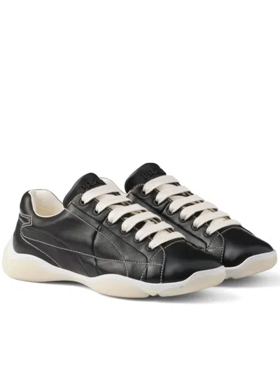 Prada Handcrafted Leather Sneakers Geometric Stitching In Black