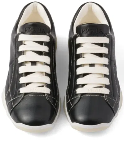 Prada Handcrafted Leather Sneakers Geometric Stitching In Black