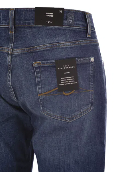 Seven For All Mankind "slimmy Tapered Reason" Jeans In Blue