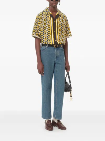 Valentino Five-pocket Denim Trousers Featuring Button Embellishments