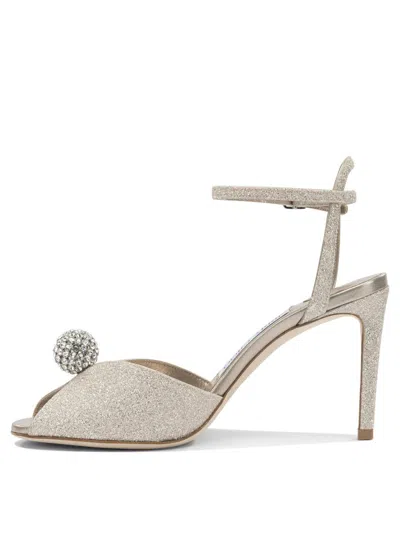Jimmy Choo Sacora 85mm Sandals Gold In White