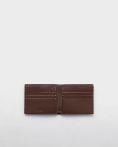 Prada Grained Leather Bi-fold Wallet In Brown