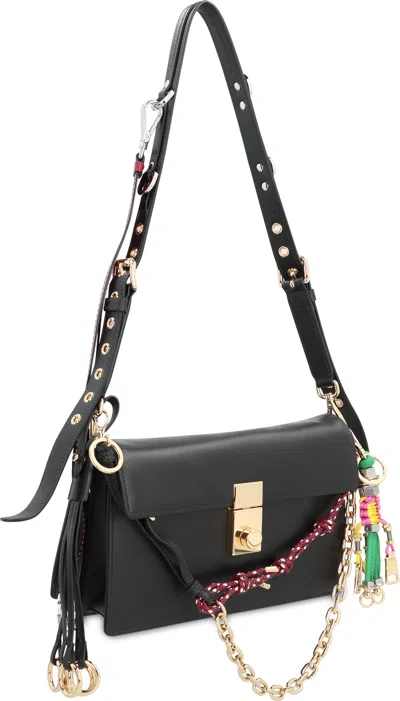 Prada Soft Sound Small Leather Shoulder Bag With Charms In Black