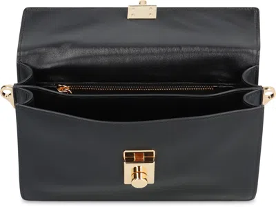 Prada Soft Sound Small Leather Shoulder Bag With Charms In Black