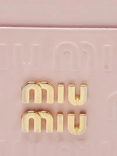 Pre-owned Miu Miu Embossed-monogram Card Holder In Pink