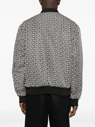 Balmain Reversible Patterned Bomber Jacket In Black