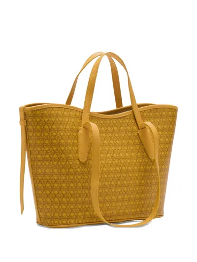 Coccinelle Monogram Straps Tote Bag In Yellow