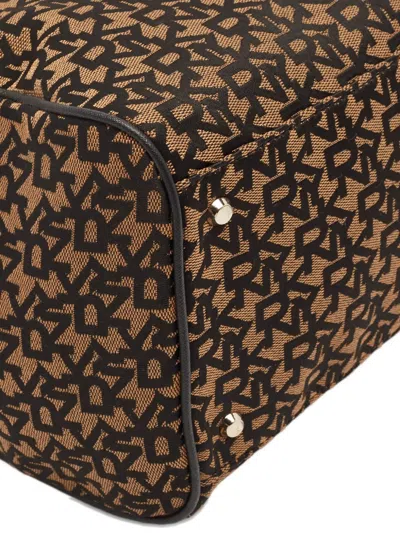 Pre-owned Dkny Vintage Monogram Duffle Bag In Brown