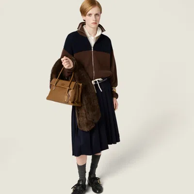 Miu Miu Logo-detail Zipped Cardigan In Brown
