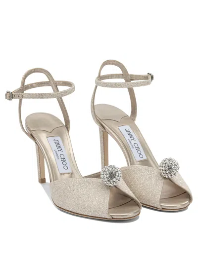 Jimmy Choo Sacora 85mm Sandals Gold In White