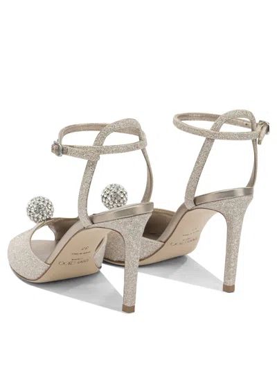 Jimmy Choo Sacora 85mm Sandals Gold In White