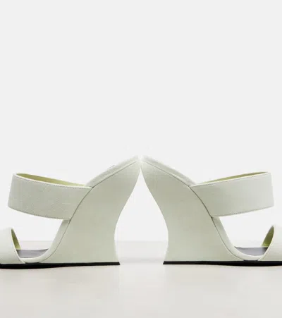 Alaïa 110 Suede Wedge Mules In White