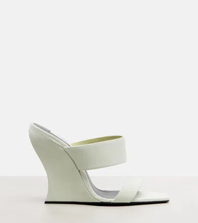 Alaïa 110 Suede Wedge Mules In White