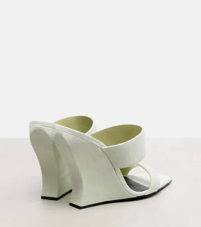 Alaïa 110 Suede Wedge Mules In White