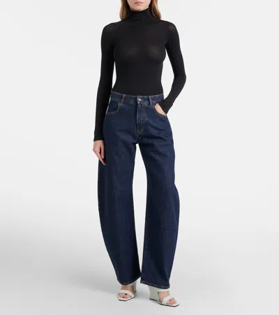 Alaïa 110 Suede Wedge Mules In White