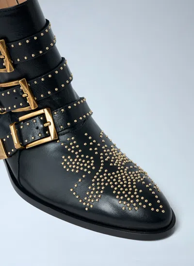Chloé Black Calf Leather Bos Taurus Lace-up Boots In Animal Print