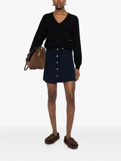 Sandro Short Ribbed Skirt With Press Studs In Black