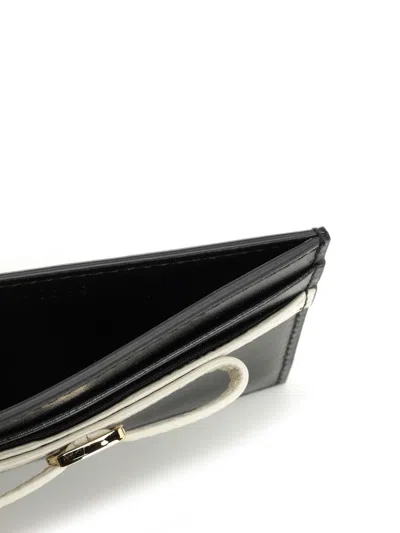 Ferragamo Bow Detailed Folded Wallet In Black