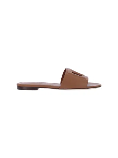 Dolce & Gabbana Slide Sandals With Cut Out Logo In Leather Woman In Brown