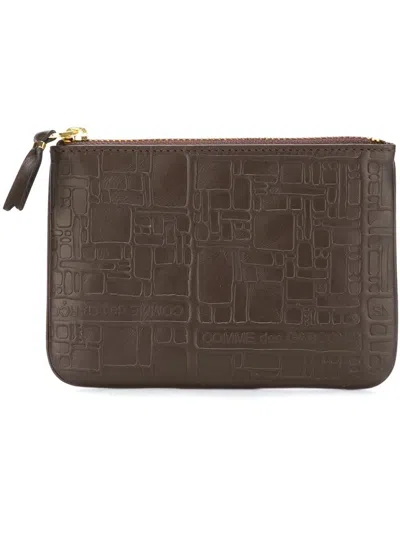 Comme Des Garçons Embossed Logotype Pouch In Brown
