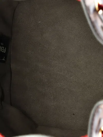 Pre-owned Fendi Mon Tresor Zucca Embossed Leather Small Bucket Bag In Brown