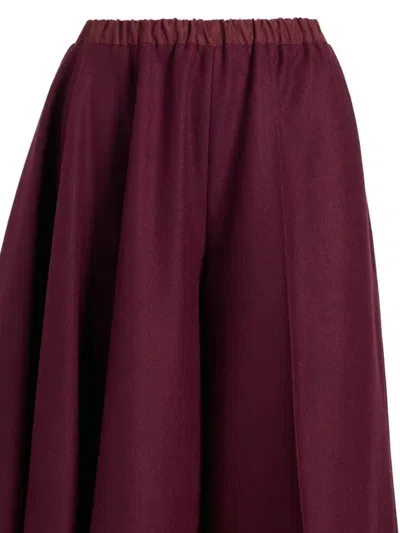 Patou Asymmetric Wool Shorts In Burgundy