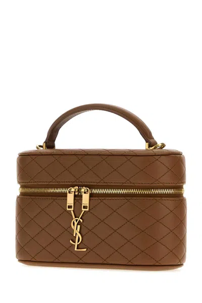 Saint Laurent Handbags. In Brown