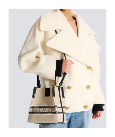 Balmain Release Bucket Bag In Canvas And Calfskin In Sand