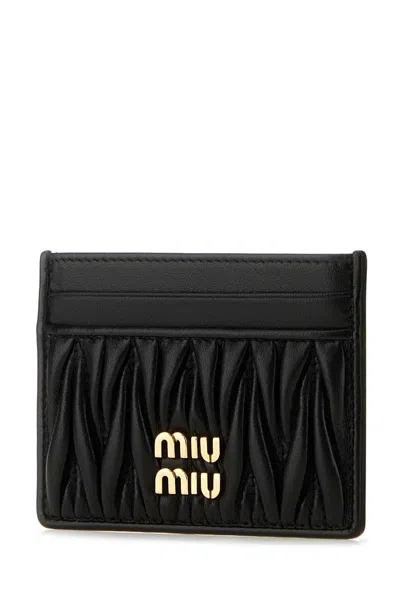 Miu Miu Quilted Black Lamb Leather Compact Wallet In Black