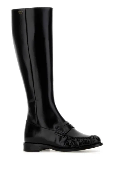 Prada Knee-high Leather Boots Glossy Finish In Black