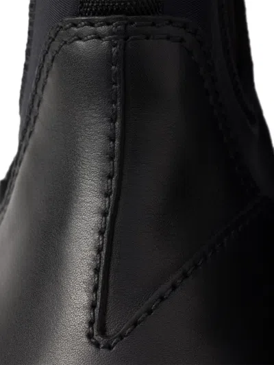 Prada Chunky Sole Leather Ankle Boots In Black