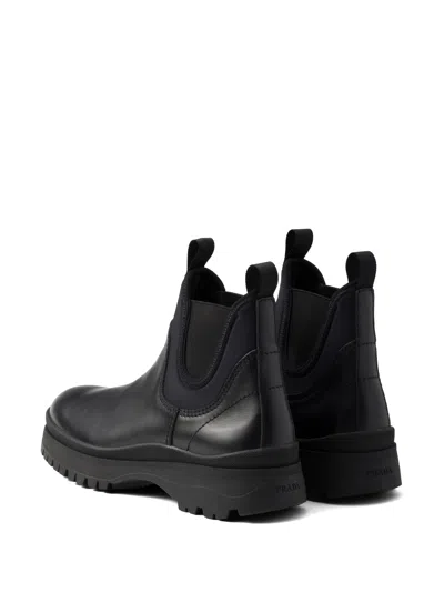 Prada Chunky Sole Leather Ankle Boots In Black
