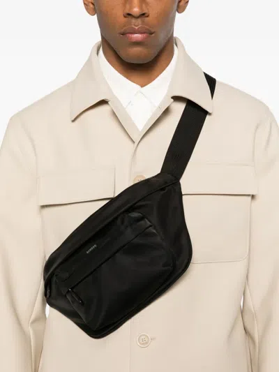 Sandro Zip-pocket Messenger Bag In Black