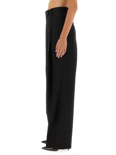 Tom Ford Tailored Wool Wide Leg Trousers In Black