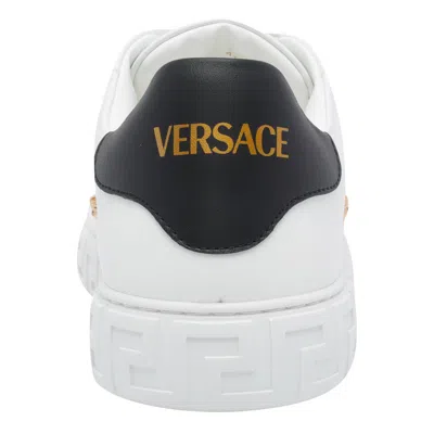 Versace Greca Studded Leather Sneakers In White