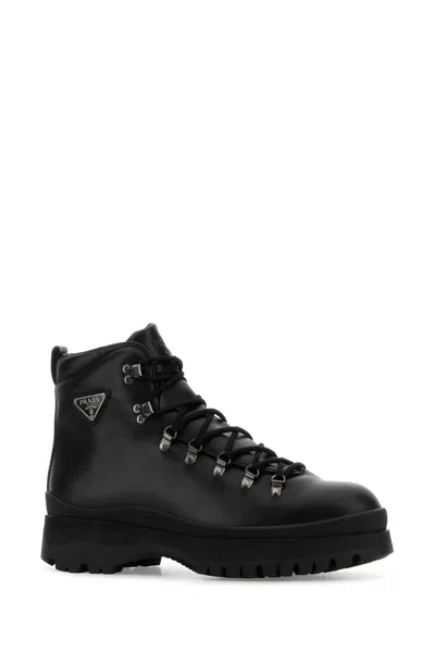 Prada Logo Plaque-detailing Boots In Black